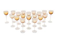 A Set of Eighteen St. Louis Grand Lieu Amber Glass Hock Wine Stems