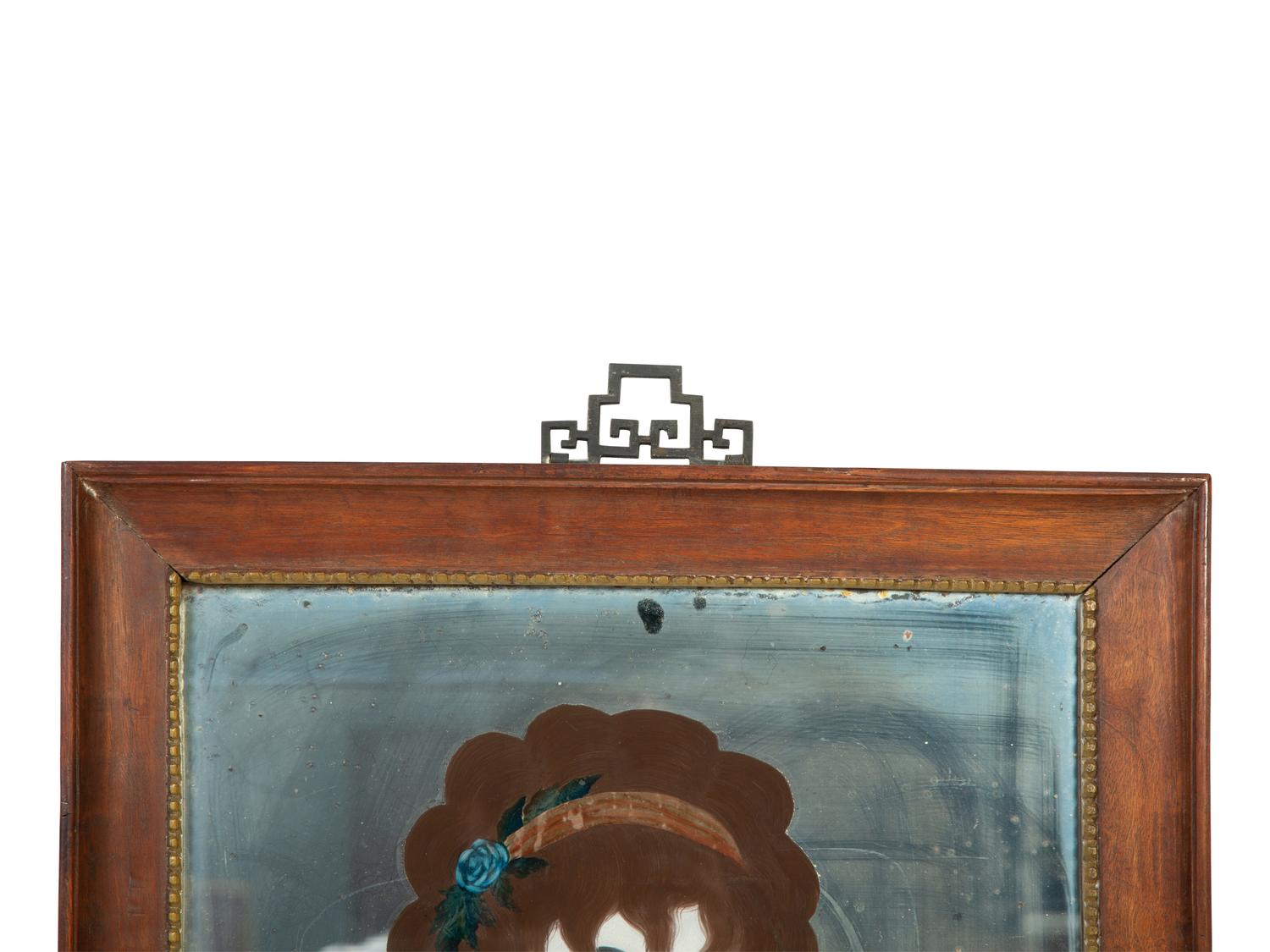 A Chinese Export Reverse Painted Portrait of a Lady — 18TH CENTURY