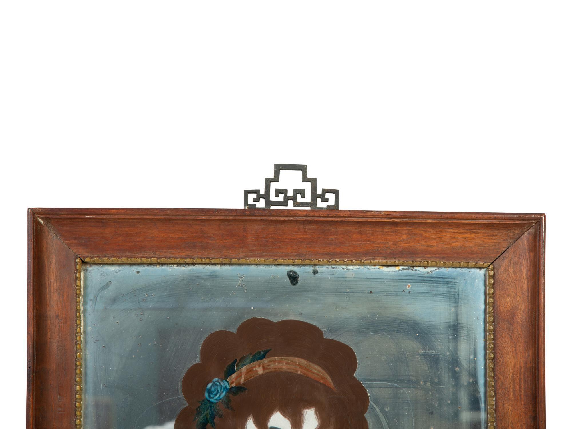 A Chinese Export Reverse Painted Portrait of a Lady — 18TH CENTURY