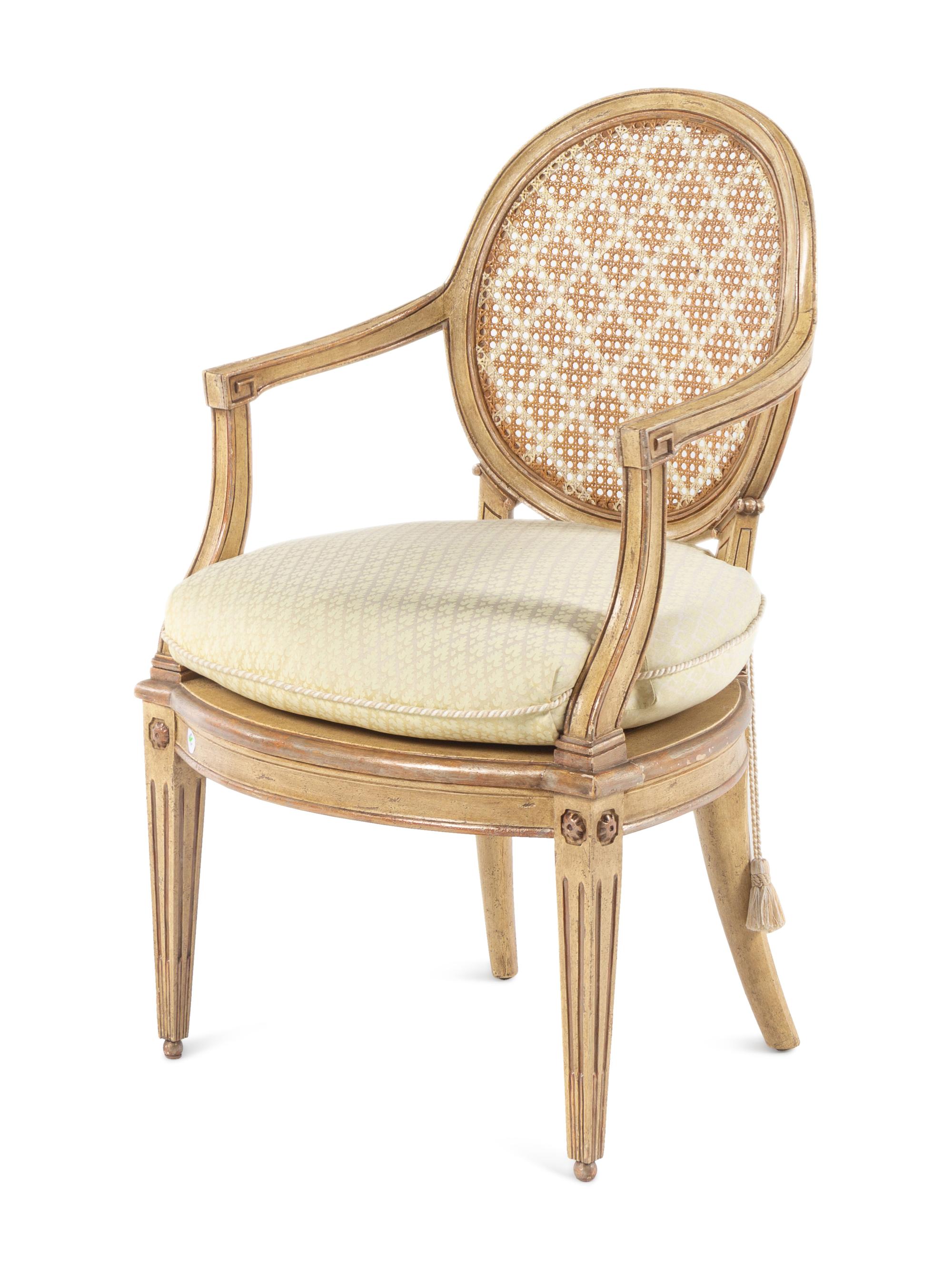 A Set of Ten Louis XVI Style Cream-Painted Dining Chairs