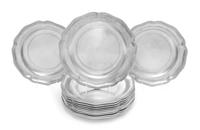 A Set of Twelve Pewter Chargers Diameter 12 inches. — STEDE