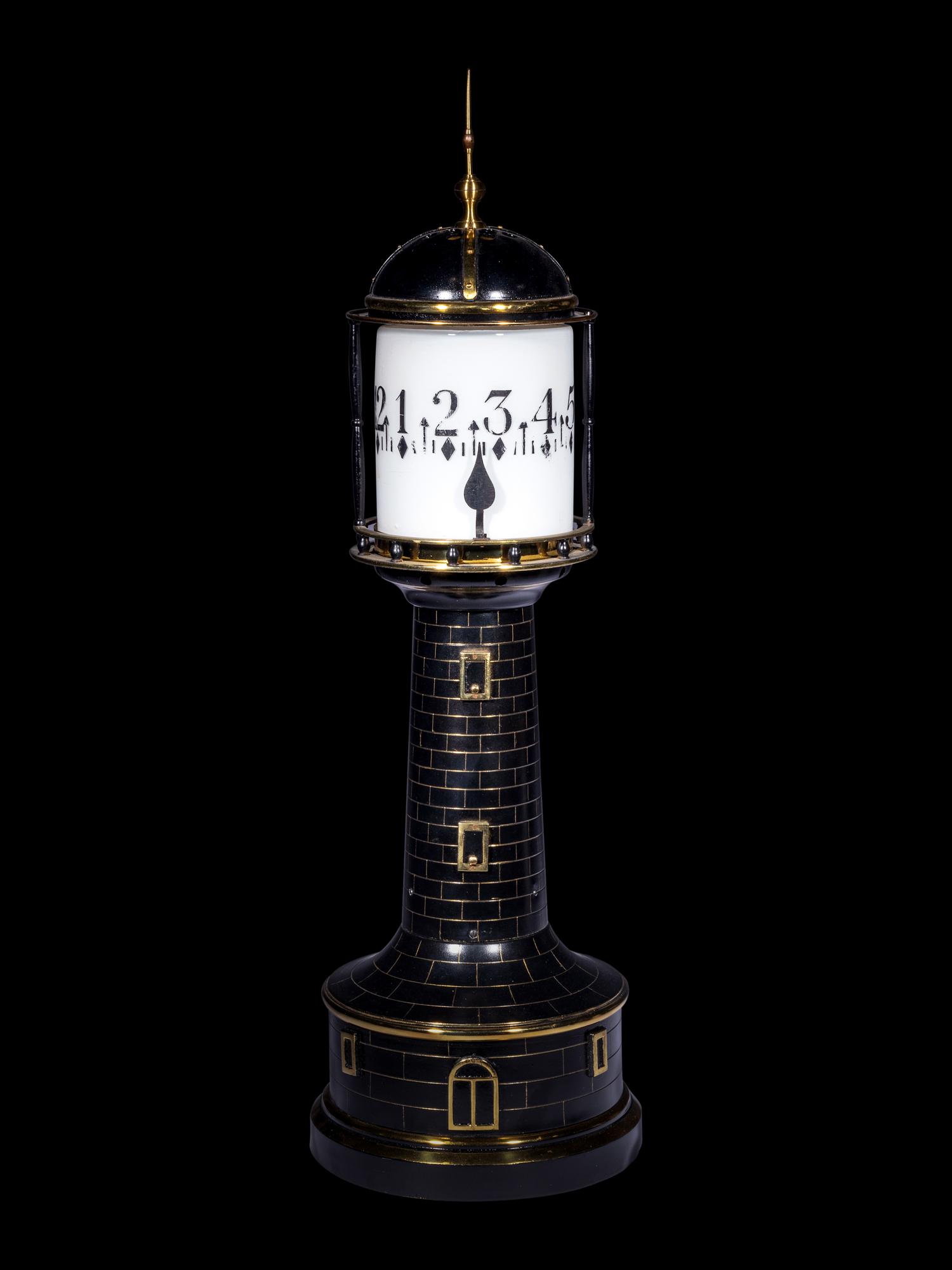 A Gilt and Patinated Lighthouse Annular Clock