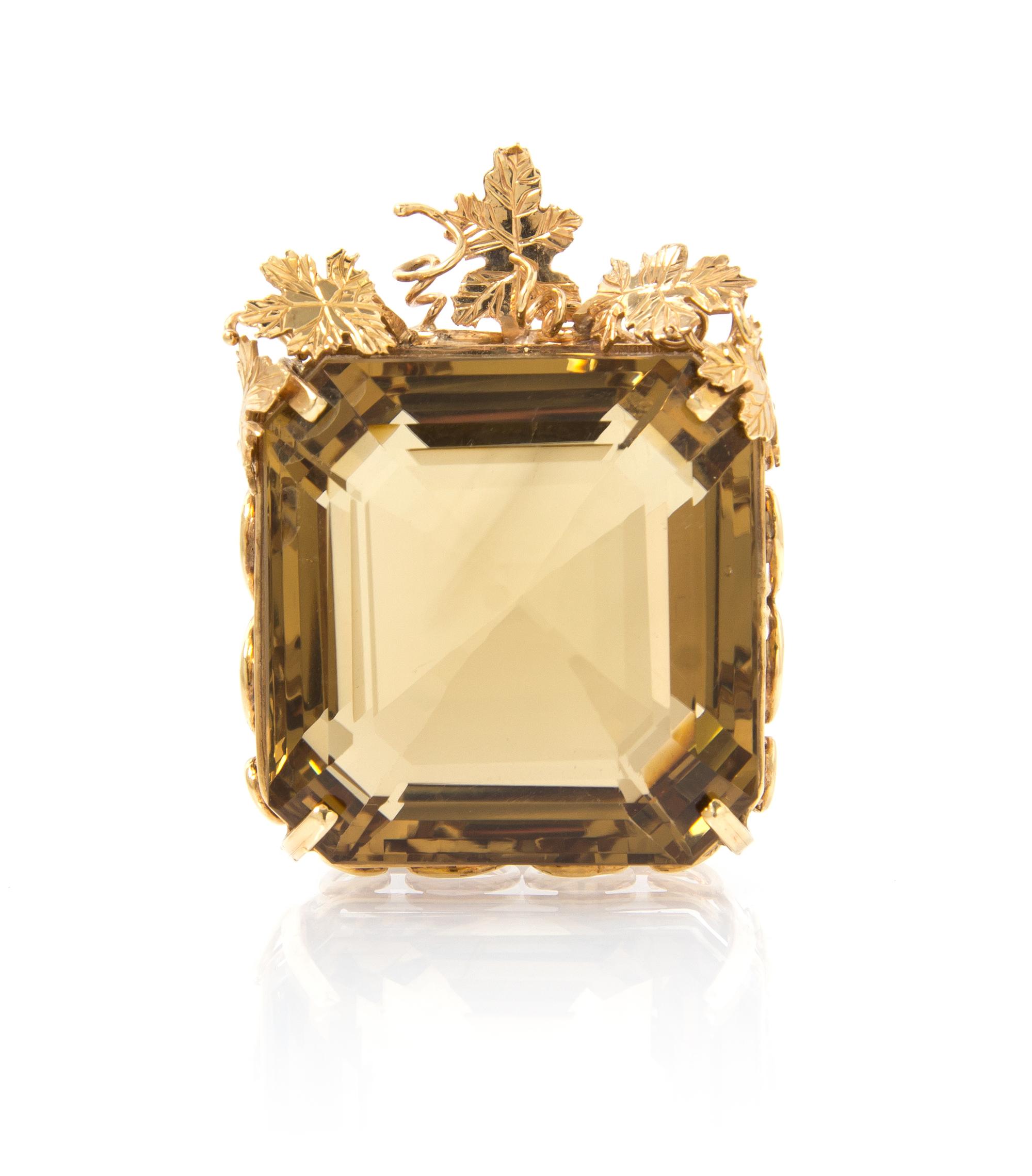 A Yellow Gold and Smokey Quartz Pendant, 37.40 dwts.