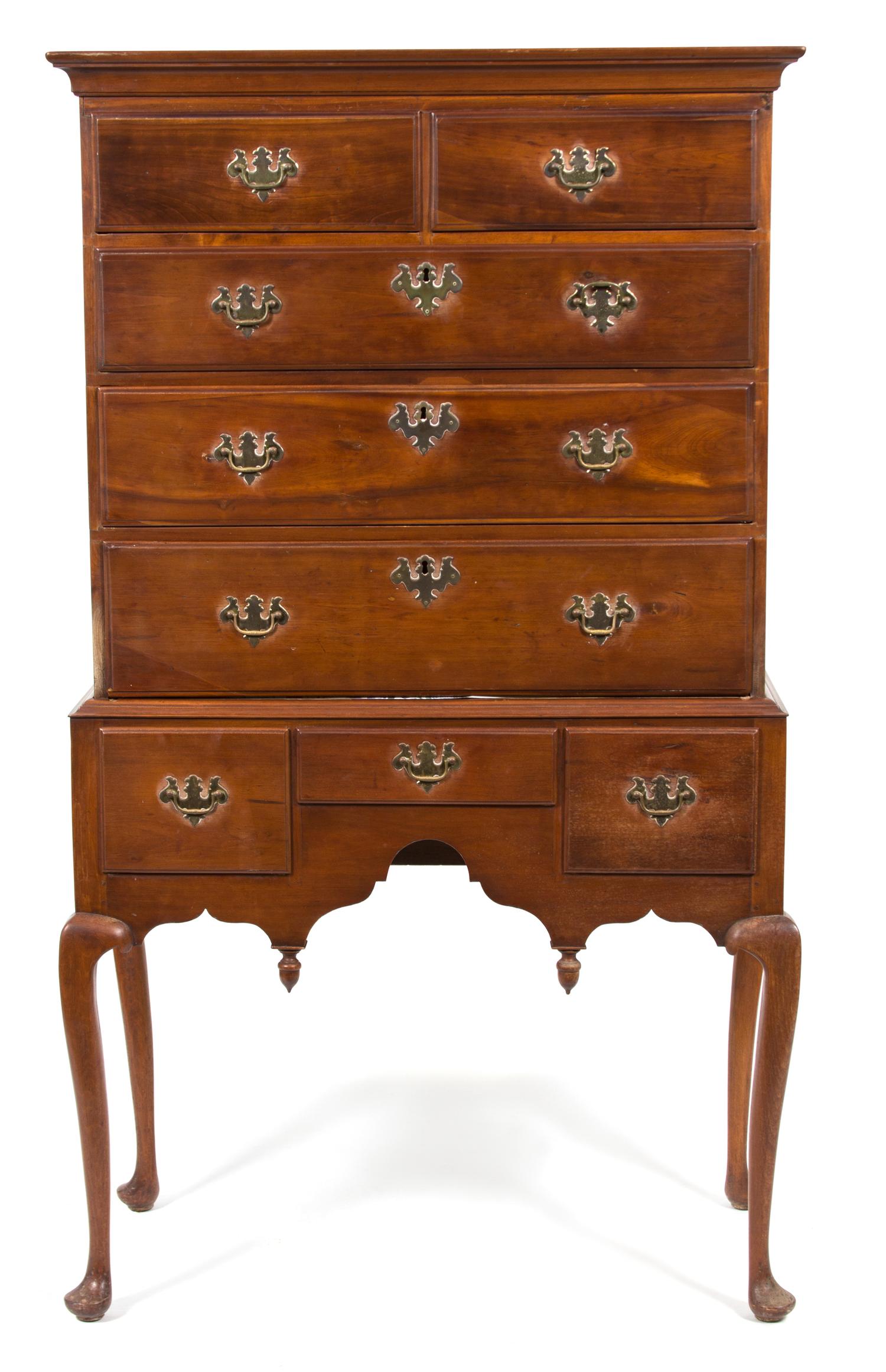 A Chippendale Style Walnut Highboy Height 66 x width 37 x depth 19 1/2 inches. — 19TH CENTURY