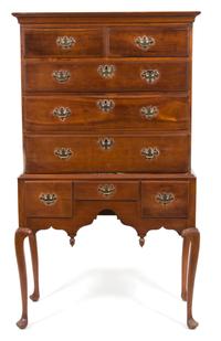 A Chippendale Style Walnut Highboy Height 66 x width 37 x depth 19 1/2 inches. — 19TH CENTURY