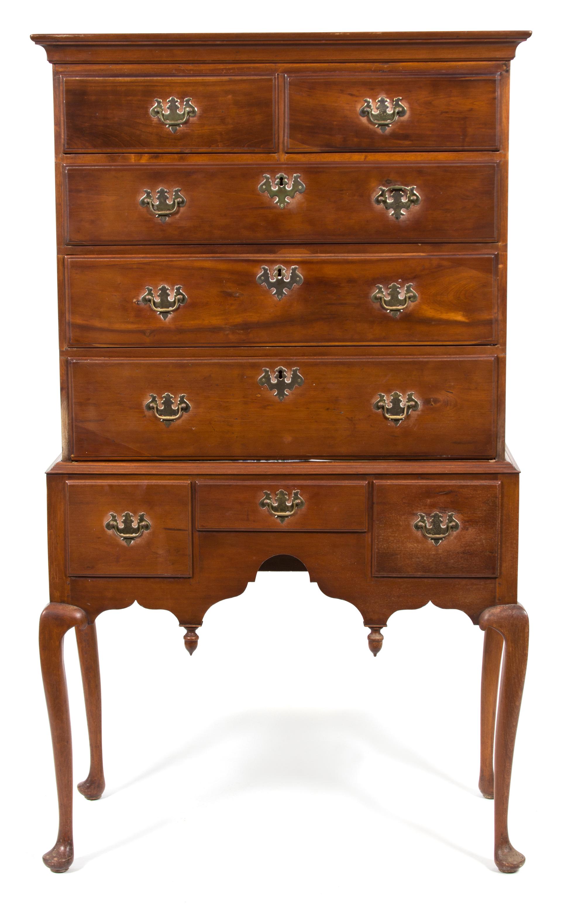 A Chippendale Style Walnut Highboy Height 66 x width 37 x depth 19 1/2 inches. — 19TH CENTURY