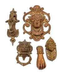 A Collection of Twelve Continental Bronze Door Knockers