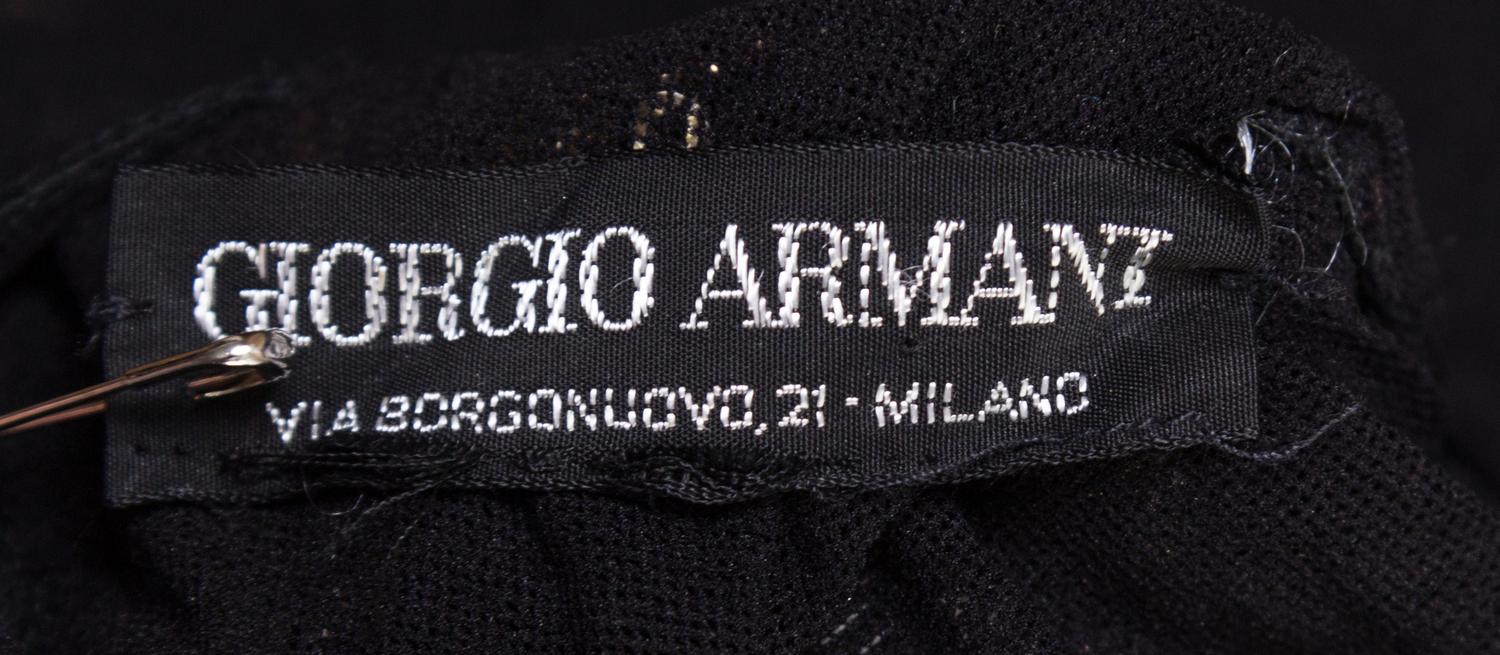 A Giorgio Armani Black Net and Gold Sequin Bodysuit,