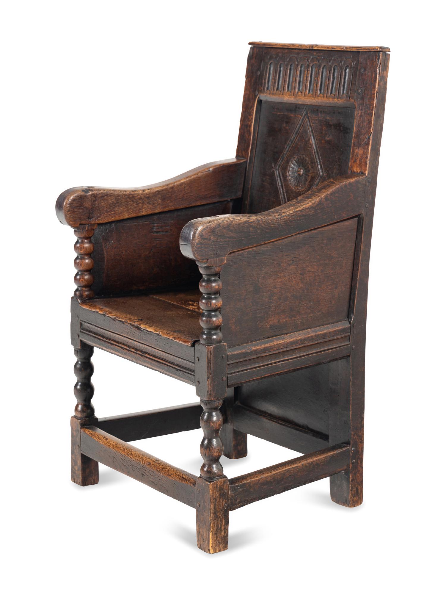 A Charles II Oak Armchair