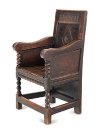 A Charles II Oak Armchair