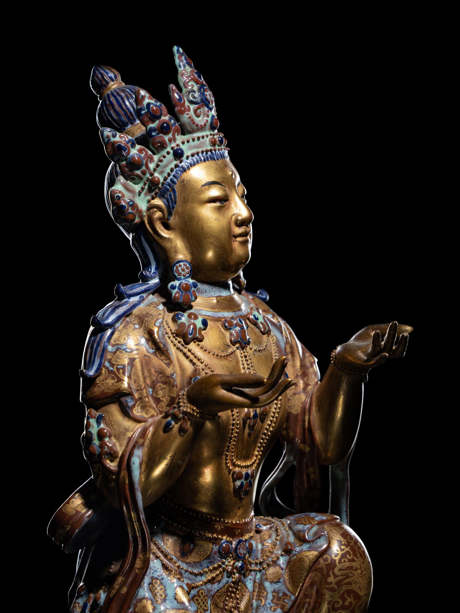 A Gilt Decorated Robin's Egg Glazed Porcelain Figure of Guanyin