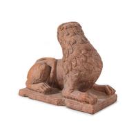 A Continental Carved Figure of a Recumbent Lion