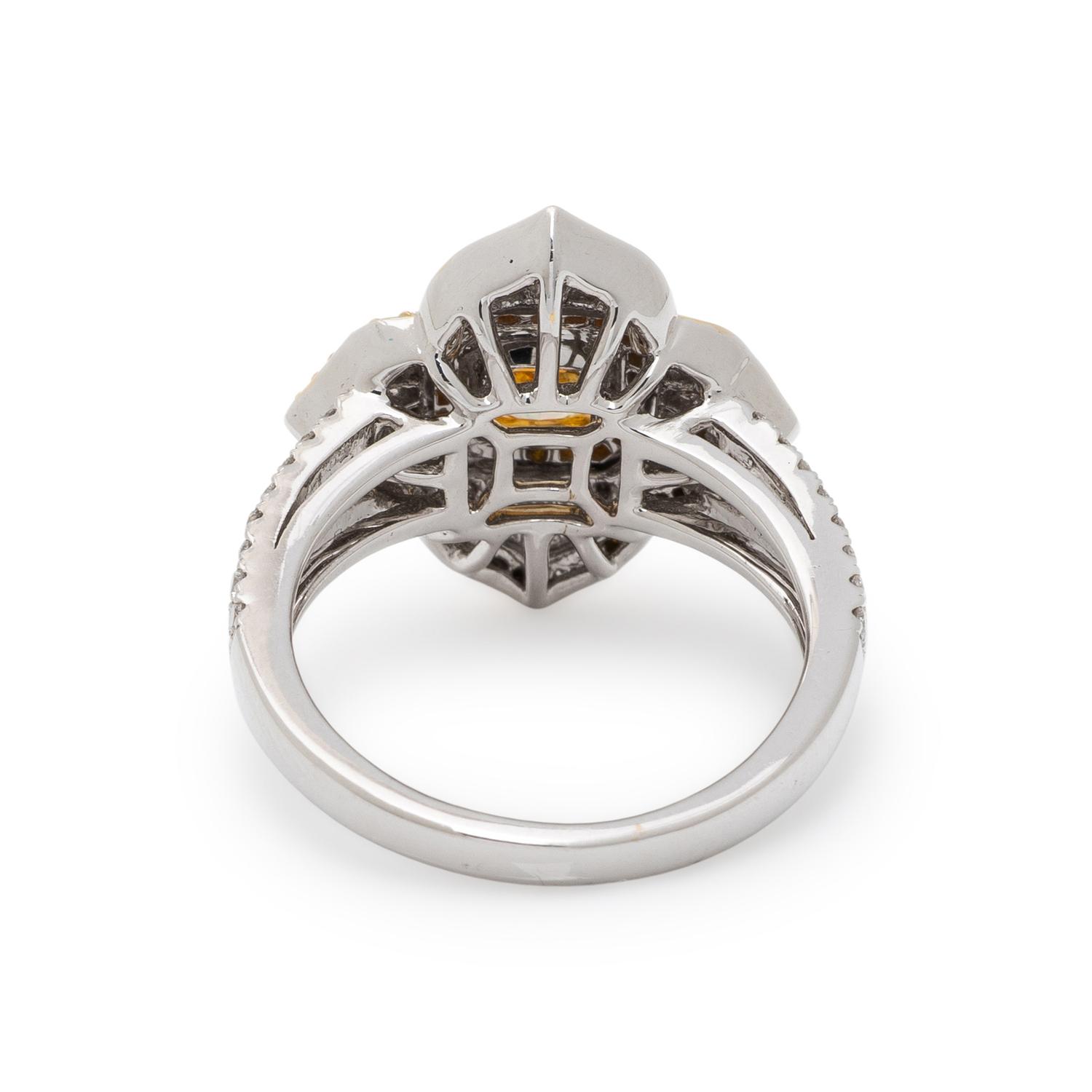 FANCY INTENSE YELLOW DIAMOND AND DIAMOND RING