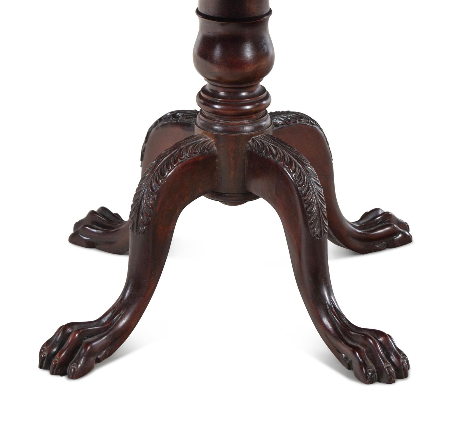 A Late Classical Carved and Figured Mahogany Work Table
