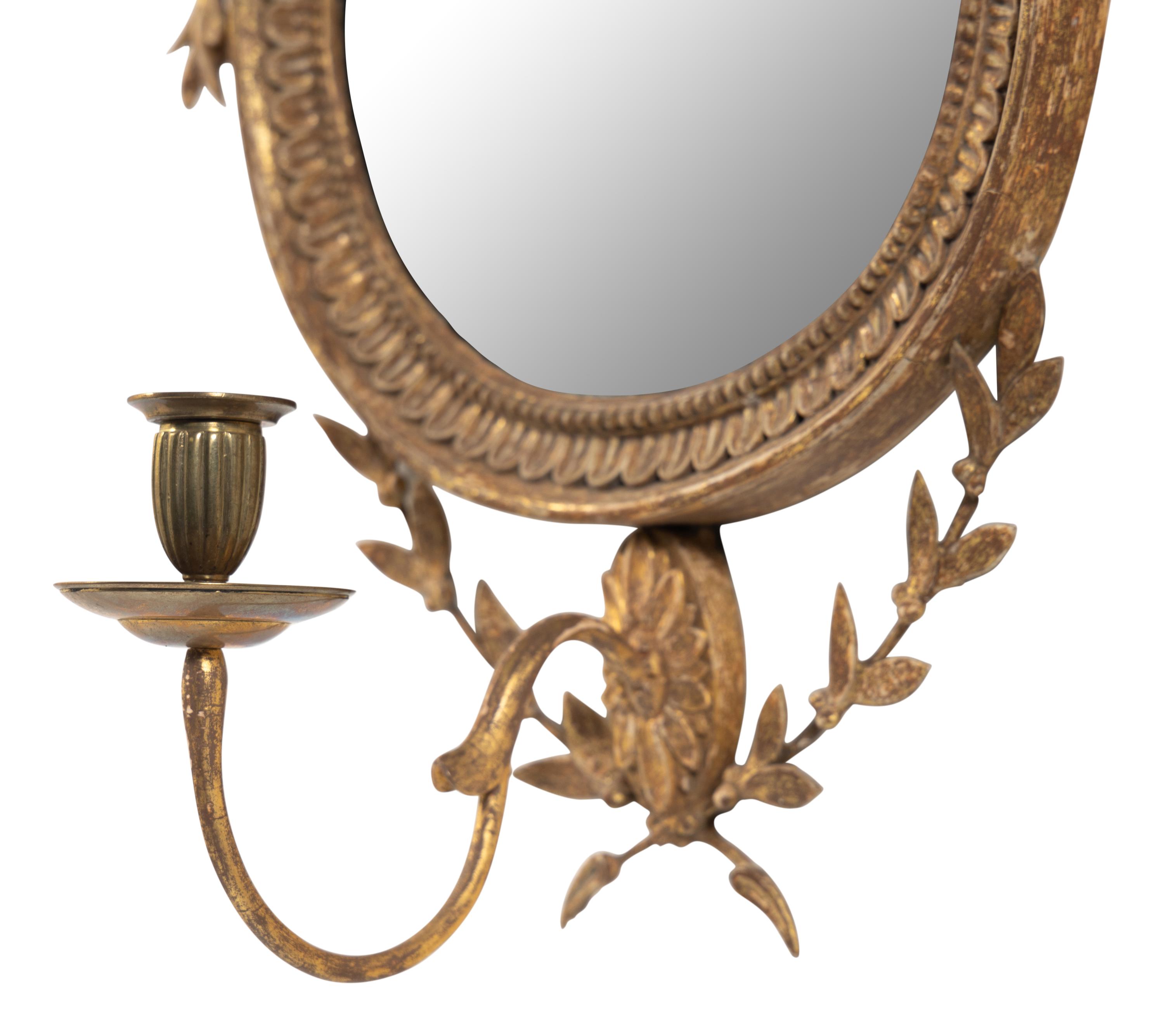 A Pair of George III Giltwood Girandole Mirrors