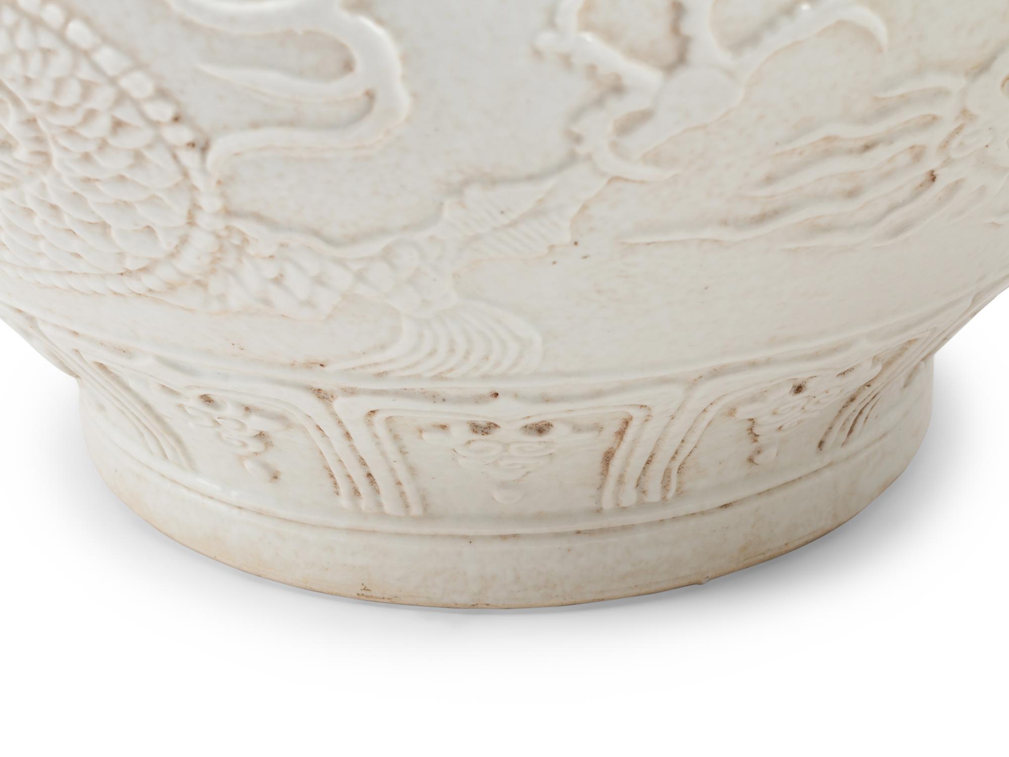 A Pair of Chinese White-Glazed Porcelain Jars