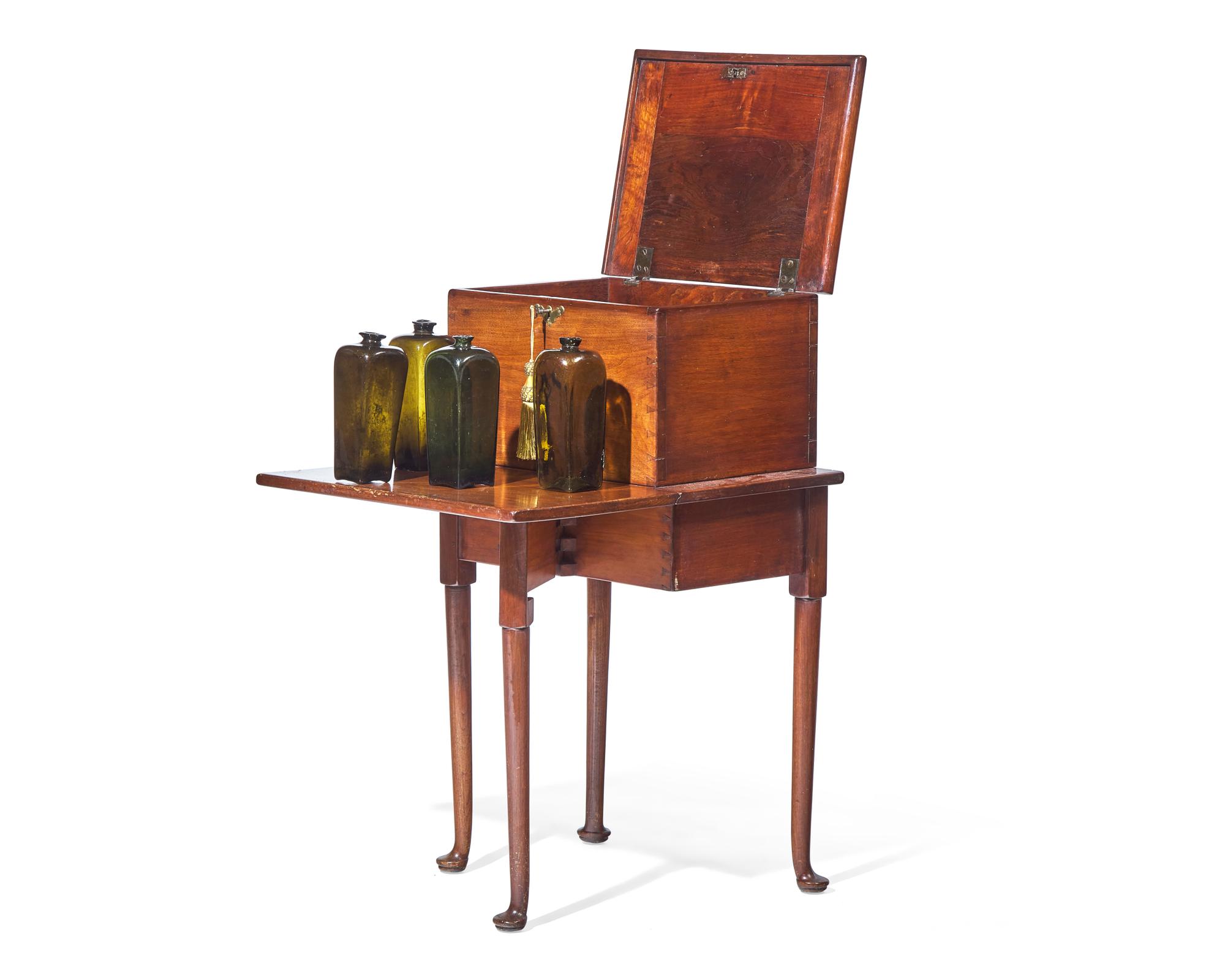 A Queen Anne Walnut Bottle Case on Stand with Drop Leaf
