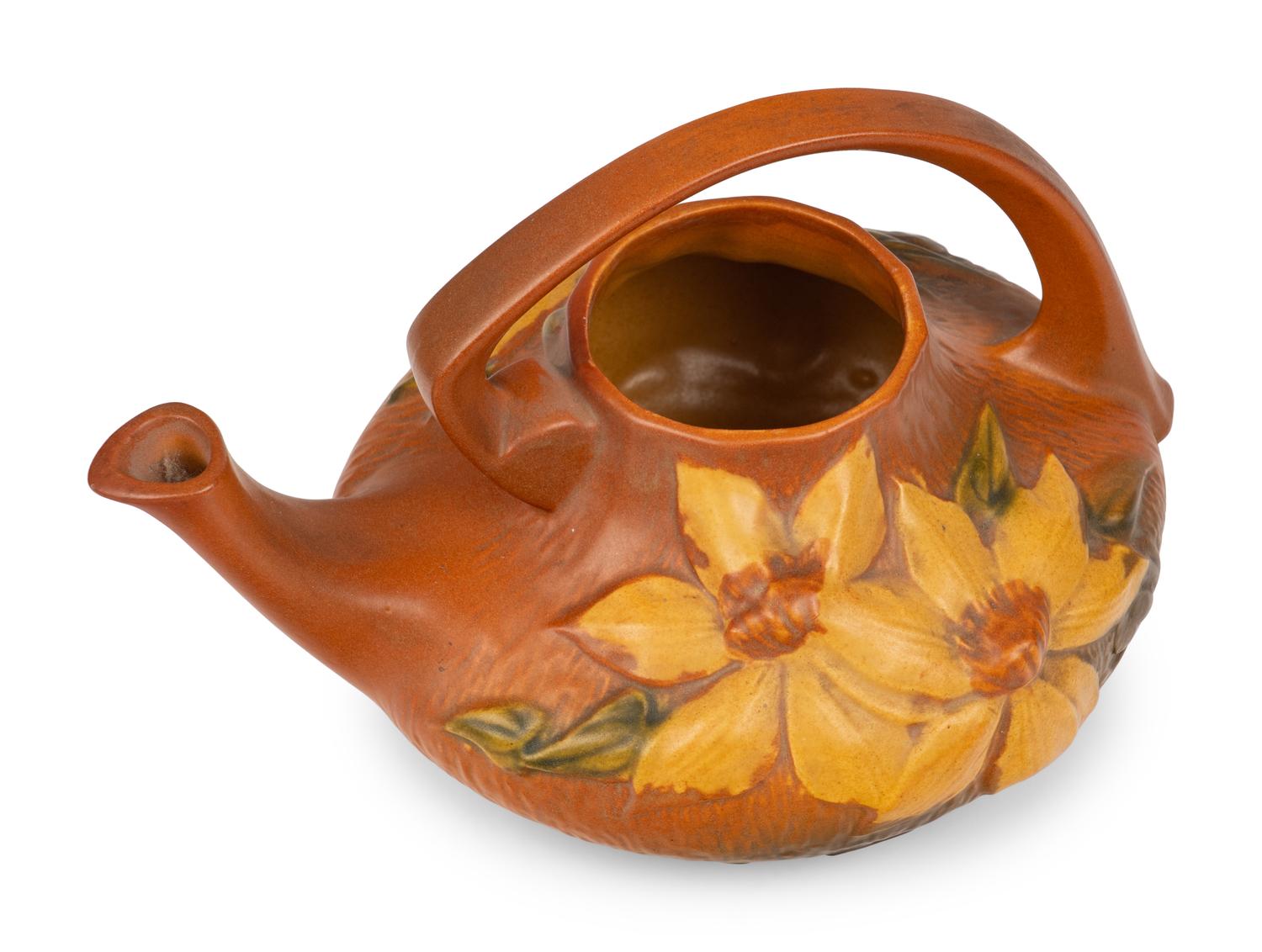 A Group of Ten Roseville Lily Pottery Articles
