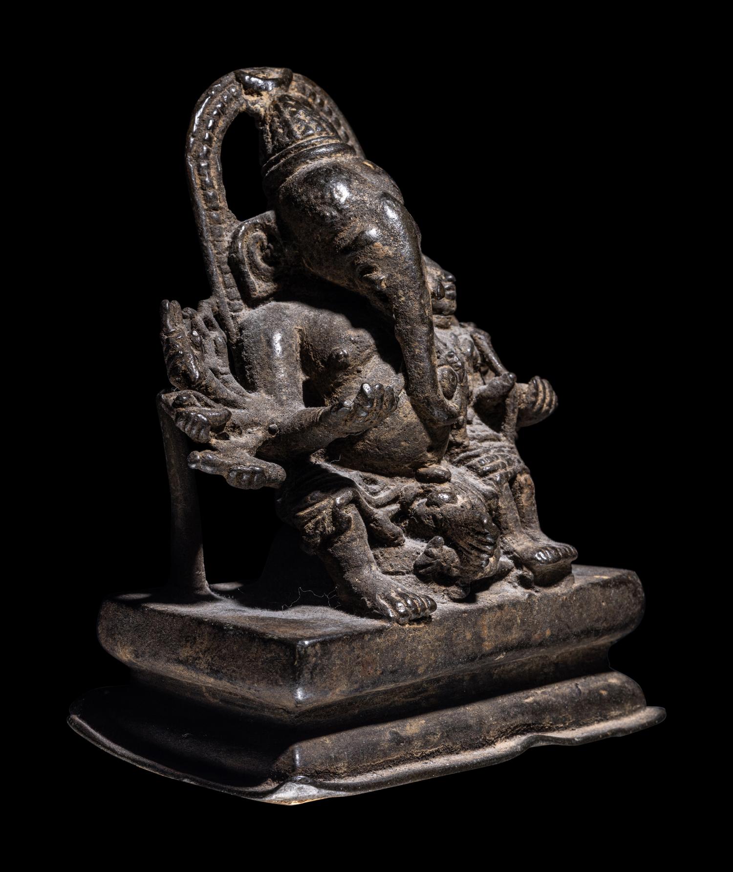 An Indian Bronze Figural Group of Ganesh and an Attendant