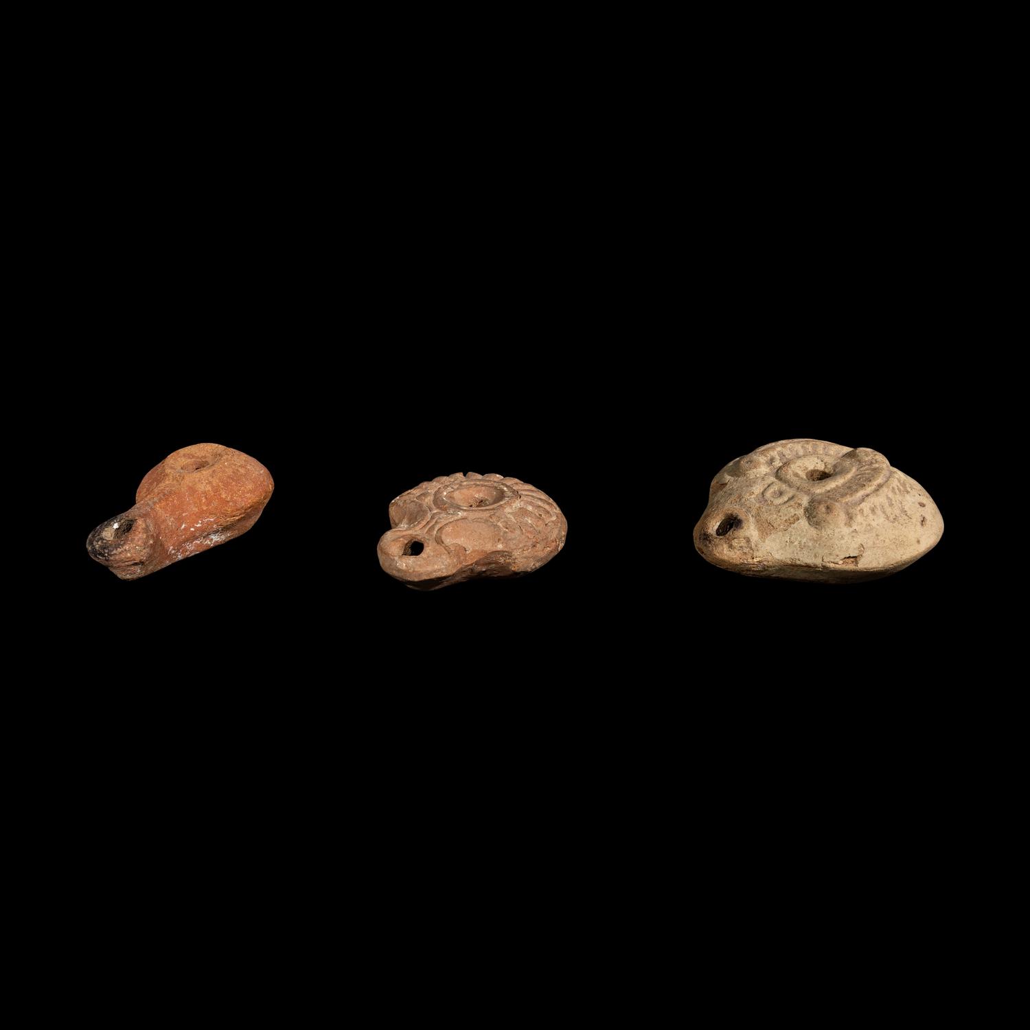 Three Roman Terracotta Oil Lamps