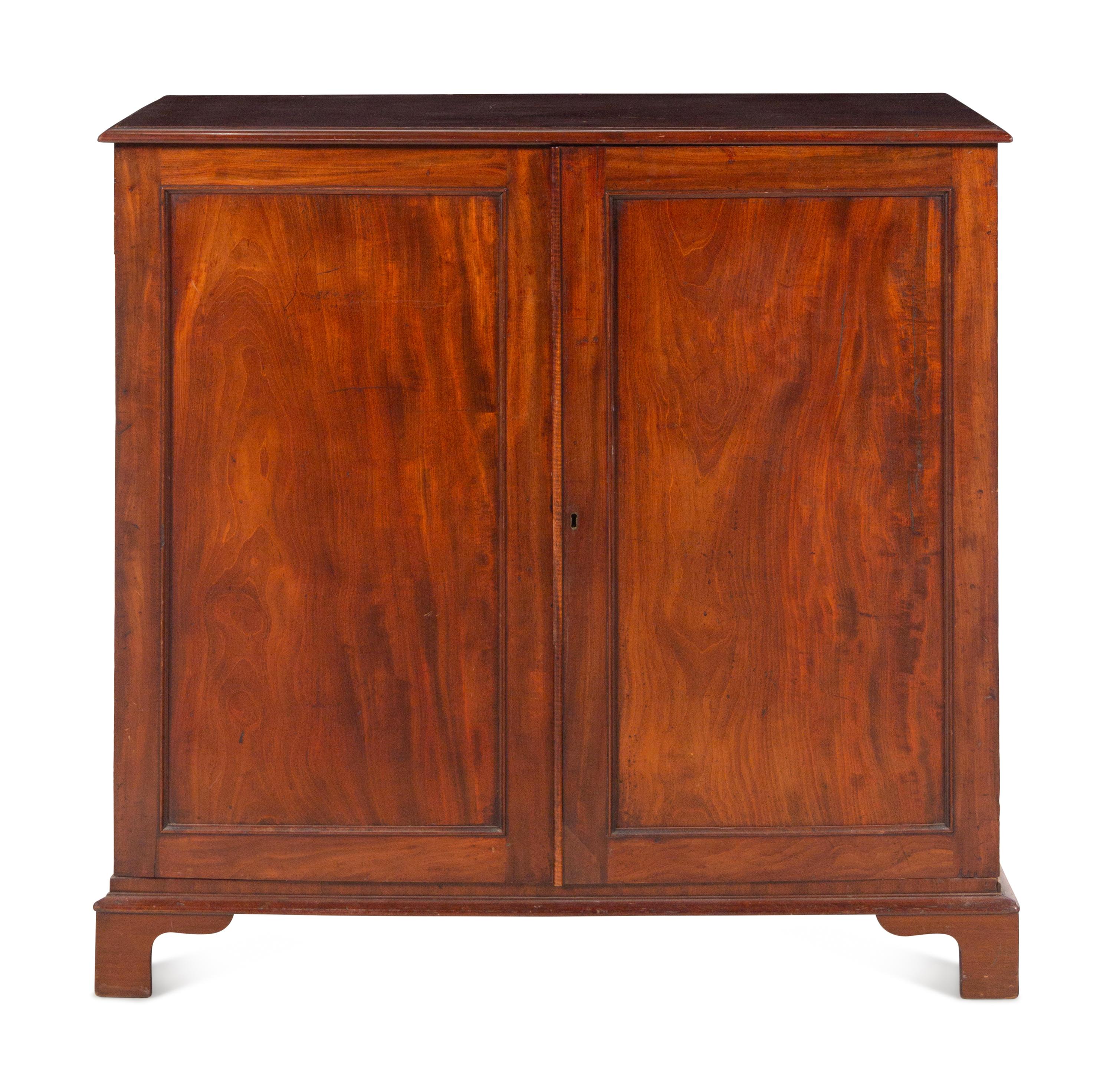 An English Mahogany Collector’s Cabinet