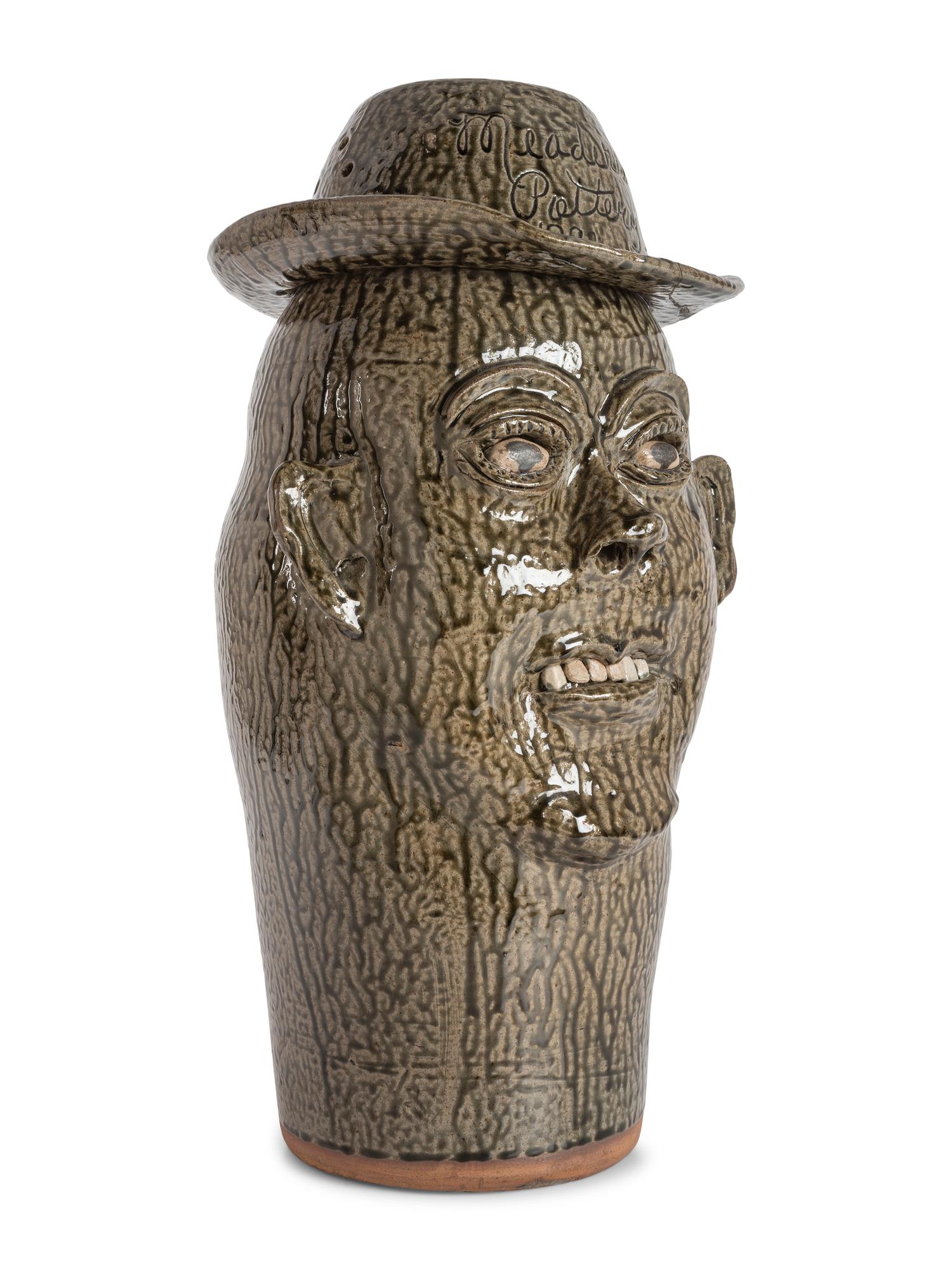 A Cleater and Billie Meaders Stoneware Face Jug