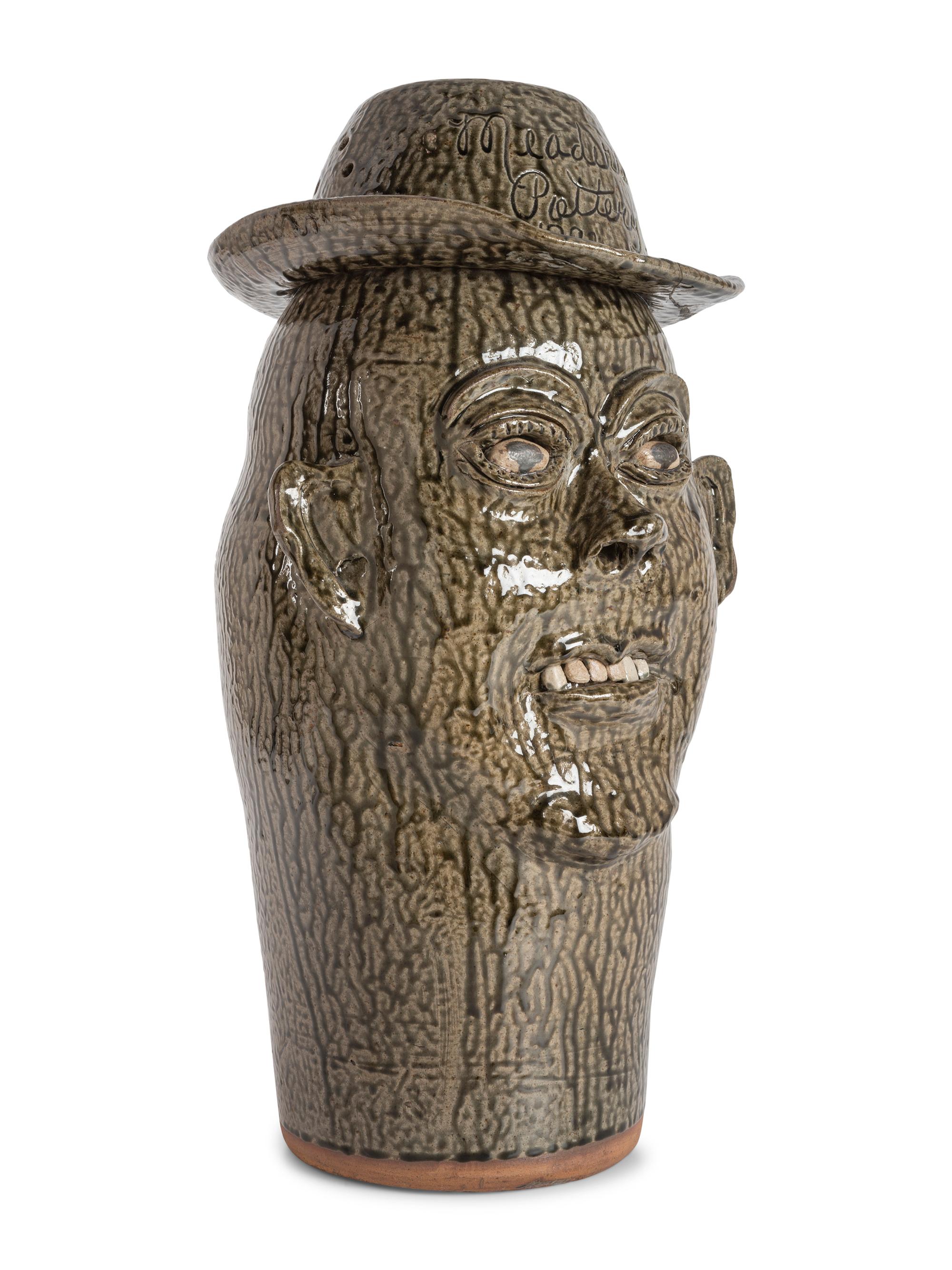 A Cleater and Billie Meaders Stoneware Face Jug