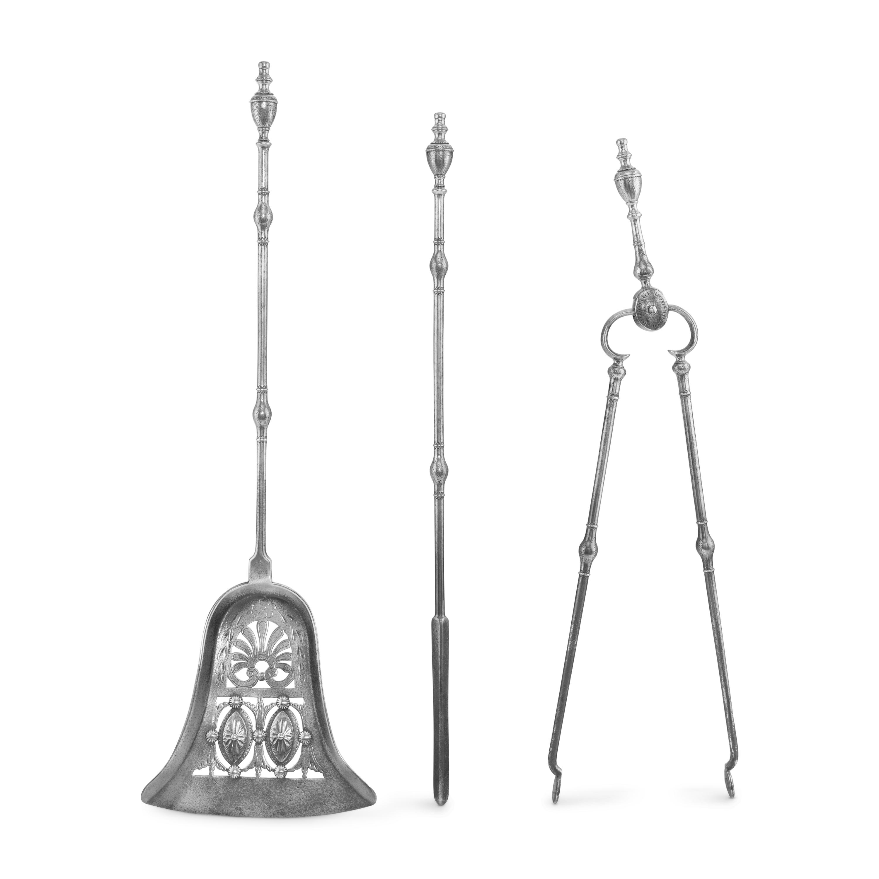 A George III Steel Serpentine Fender and Fireplace Tools