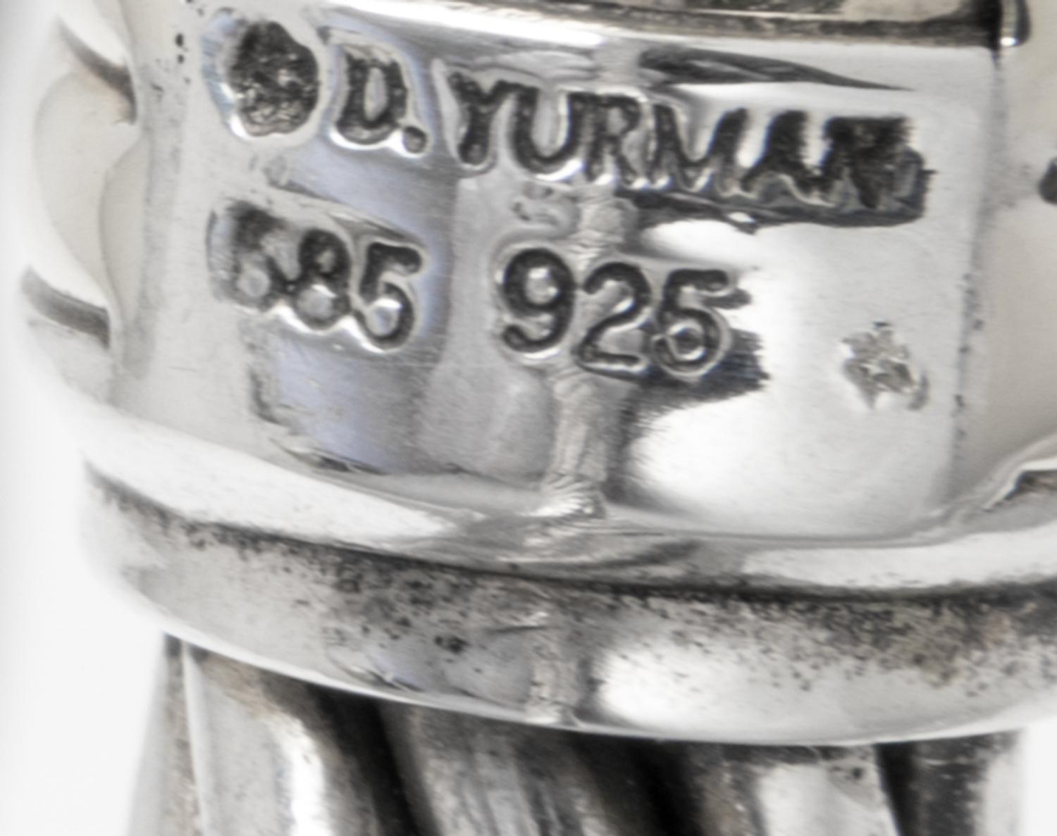 A Sterling Silver and 14 Karat Yellow Gold 'Cable Classics' Bracelet, David Yurman, 32.60 dwts.