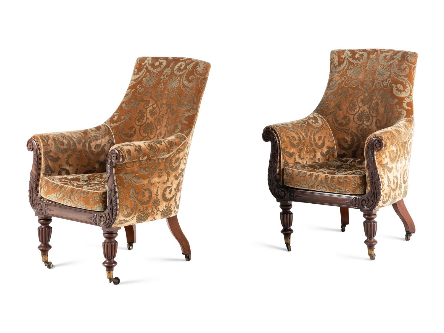 A Pair of William IV Carved Walnut Library Armchairs