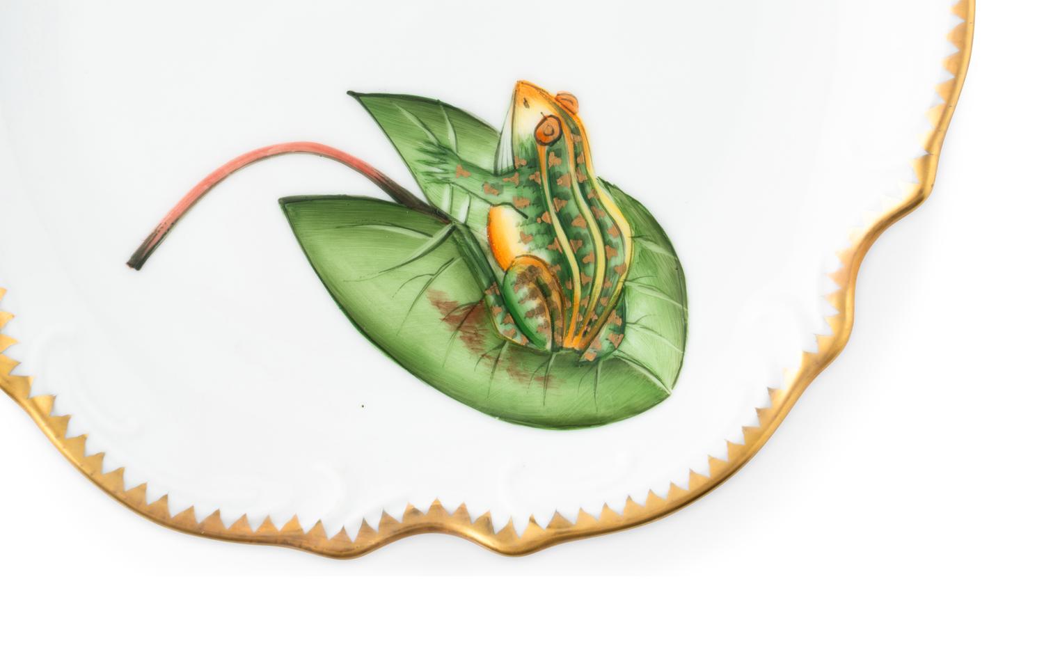 An Anna Weatherley Green Leaf Porcelain Dinner Service