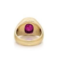 YELLOW GOLD AND INTENSE PURPLISH PINK SAPPHIRE RING