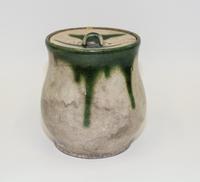 A Japanese Stoneware Jar and Cover Height 7 1/2 inches.