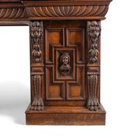 An English Renaissance Revival Carved Oak Serving Table