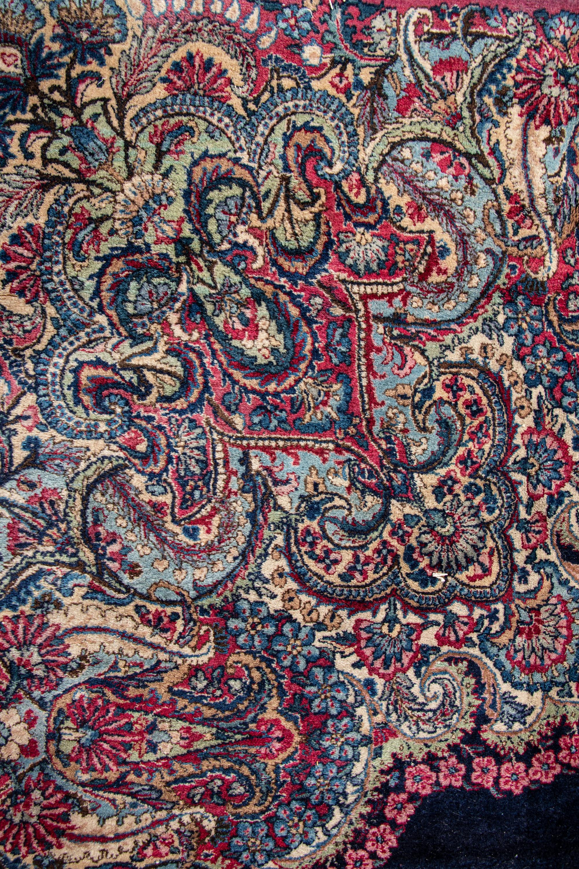 A Kirman Wool Rug