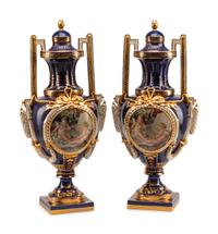 A Pair of Sèvres Style Porcelain Urns