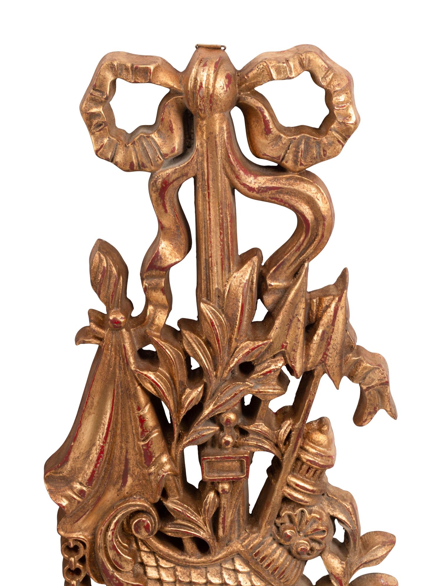 A Set of Four French Carved Giltwood Plaques
