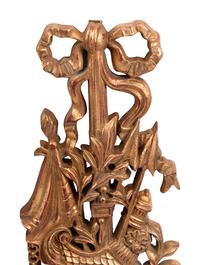 A Set of Four French Carved Giltwood Plaques
