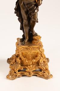 A Pair of Parcel-Gilt and Patinated Bronze Figural Eight-Light Candelabra — 19TH CENTURY