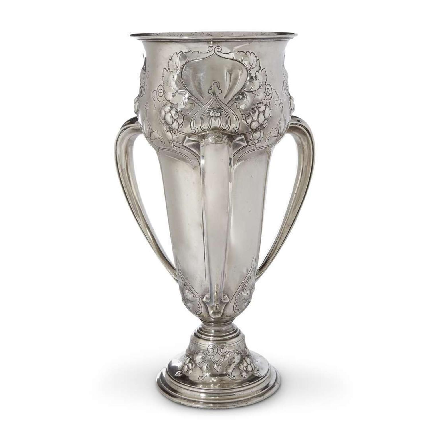 An American sterling silver Art Nouveau three-handled presentation cup reed & barton, taunton, massachusetts, circa 1900