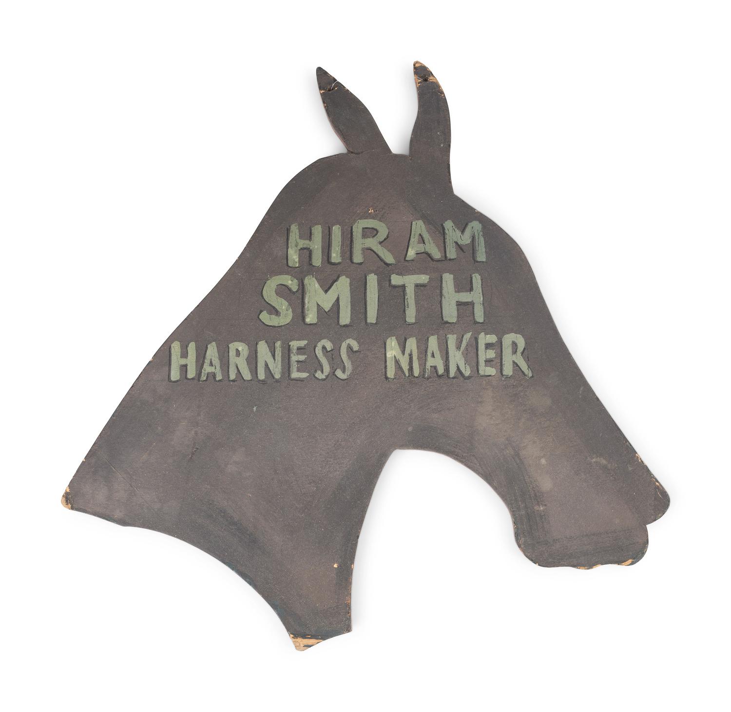 A Wrench-From Trade Sign and a Harness Maker Trade Sign