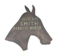 A Wrench-From Trade Sign and a Harness Maker Trade Sign