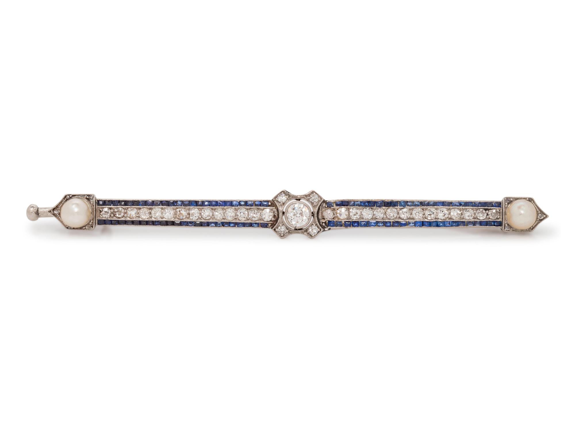 An Art Deco Platinum, Diamond, Sapphire and Cultured Pearl Bar Brooch,