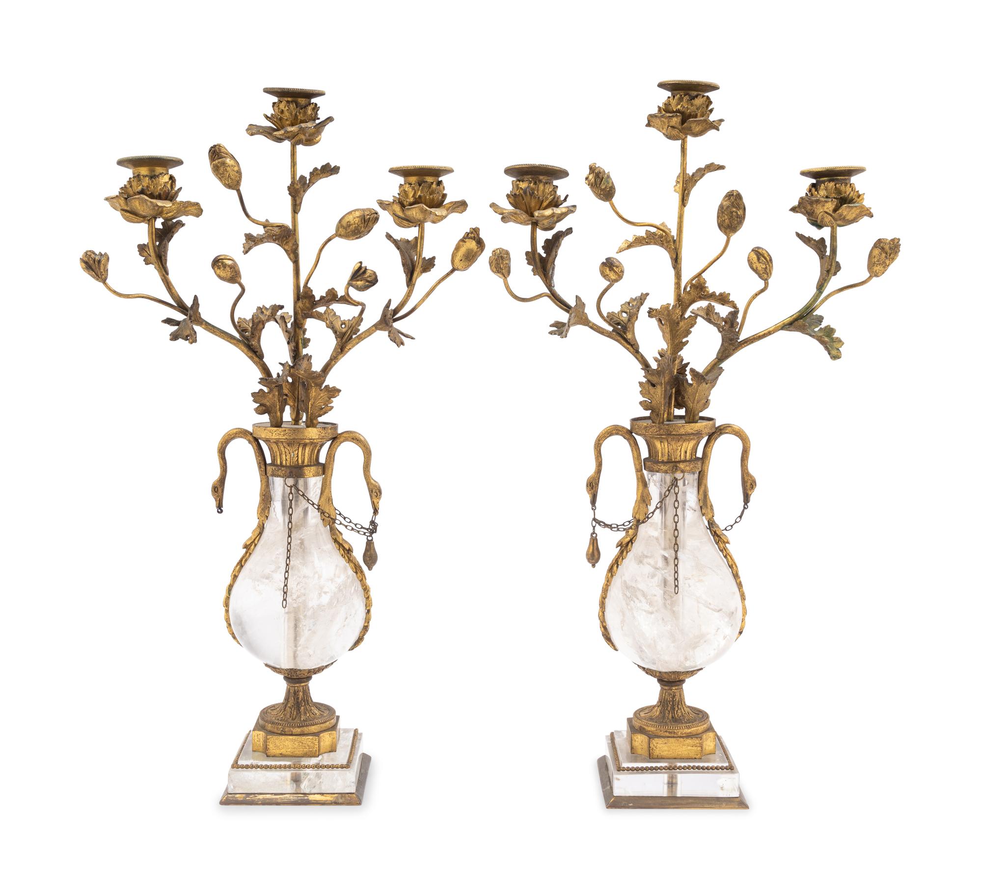 A Pair of French Gilt Bronze-Mounted Rock Crystal Three-Light Candelabra
