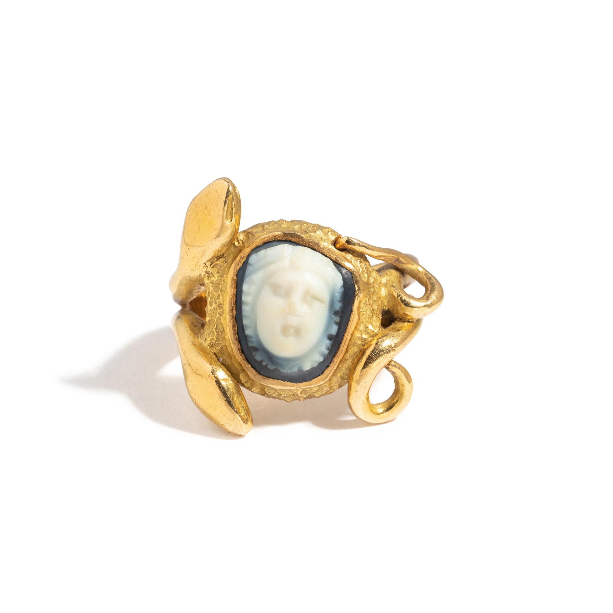 A Roman Onyx Cameo with the Head of Medusa — Set in a gold ring