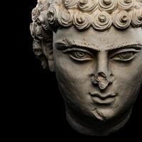 A Palmyrene Limestone Head of a Youth