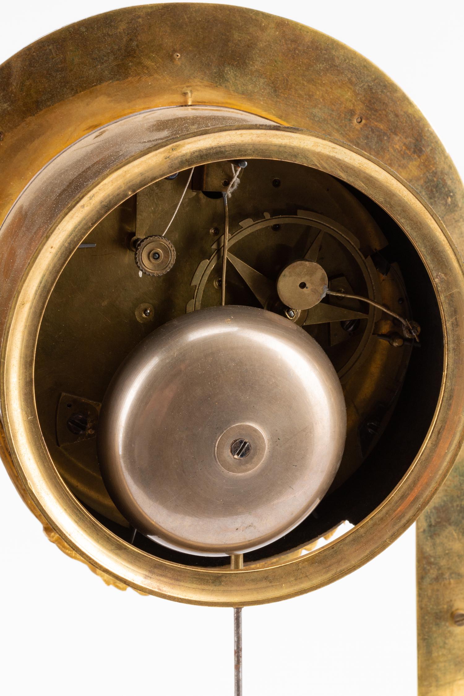 An Empire Gilt Bronze Clock