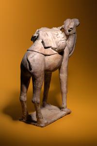 A Painted Pottery Figure of a Camel