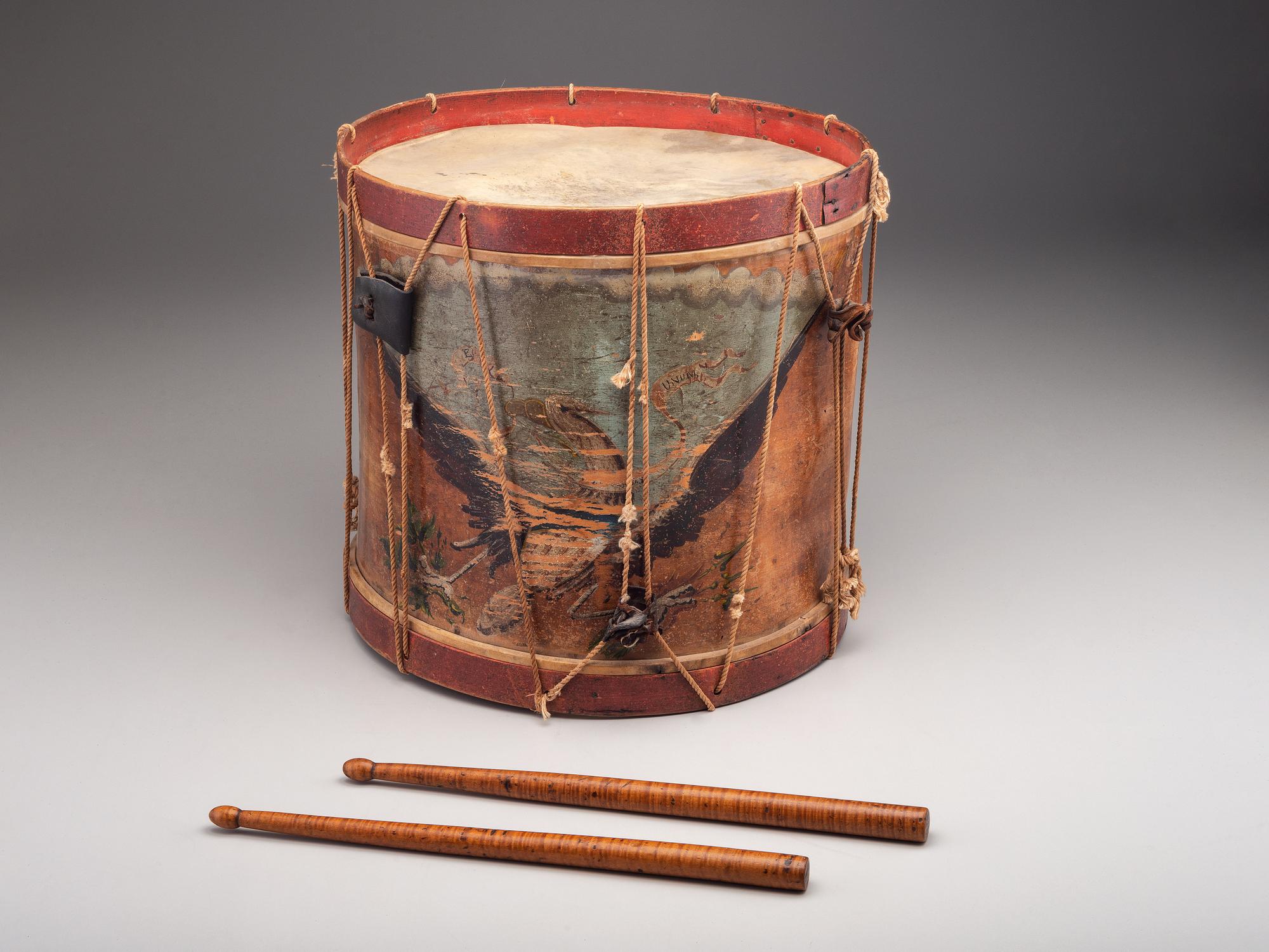 [MILITARIA]. Pre-Civil War painted drum with pair of maple sticks. Manufactured by John Ashton & Co., Boston, MA, ca 1840-1860.