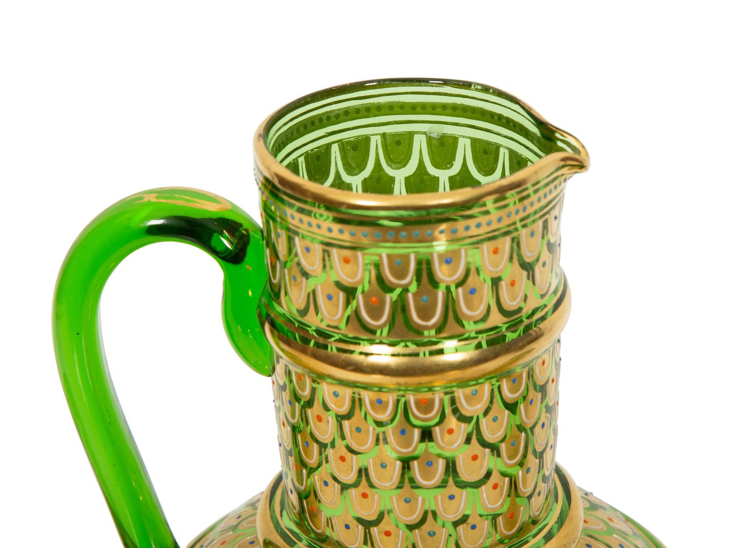A Bohemian Enameled Glass Cocktail Set and Associated Ewer